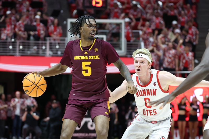 Feb 10, 2024; Salt Lake City, Utah, USA; Arizona State Sun Devils guard Jamiya Neal (5) looks to pass the ball against Utah Utes guard Hunter Erickson (0) during the first half at Jon M. Huntsman Center. Mandatory Credit: Rob Gray-USA TODAY Sports