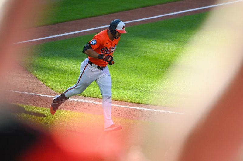 Jun 15, 2024; Baltimore, Maryland, USA;  Fans cheers  as Baltimore Orioles outfielder Anthony Santander (25) rounds the bases after hitting a two run home run in the eighth inning 
against the Philadelphia Phillies at Oriole Park at Camden Yards. Mandatory Credit: Tommy Gilligan-USA TODAY Sports