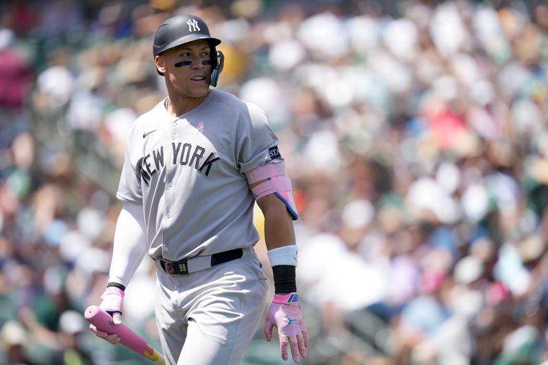 May 11, 2025; West Sacramento, California, USA; New York Yankees right fielder Aaron Judge (99) reacts after striking out against the Athletics in the first inning at Sutter Health Park. Mandatory Credit: Cary Edmondson-Imagn Images