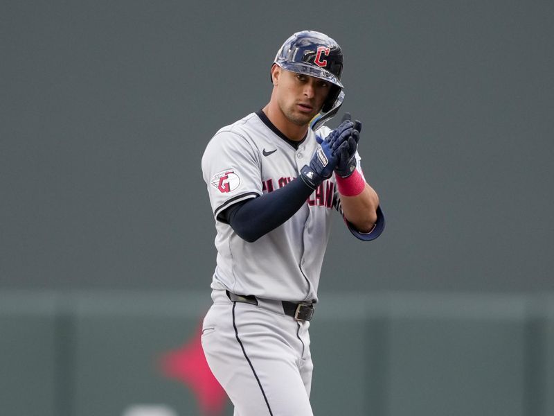 Apr 4, 2024; Minneapolis, Minnesota, USA; Cleveland Guardians center fielder Tyler Freeman (2) reacts to hitting a RBI single during the fourth inning against the Minnesota Twins at Target Field. Mandatory Credit: Jordan Johnson-USA TODAY Sports