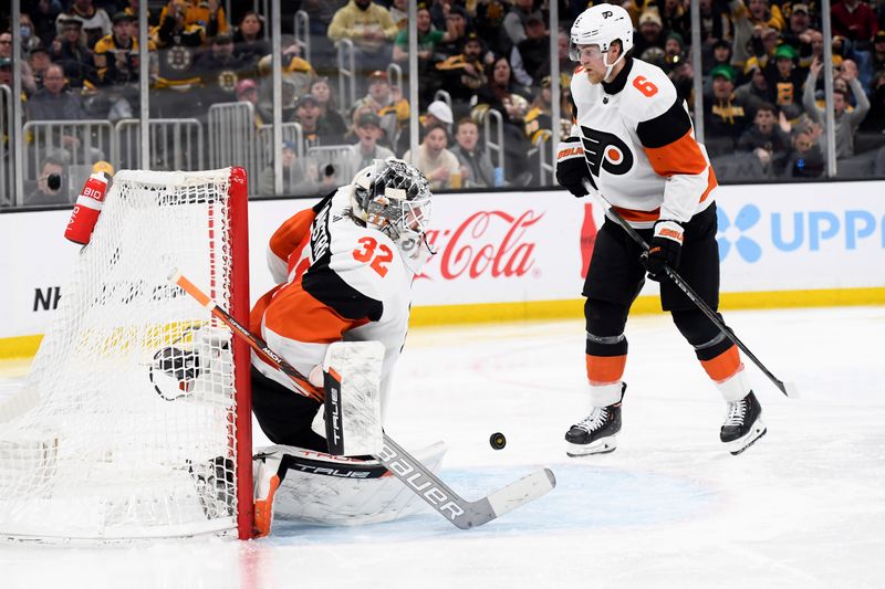 Mar 16, 2024; Boston, Massachusetts, USA; Boston Bruins center Charlie Coyle (13) (not pictured) scores a goal past Philadelphia Flyers goaltender Felix Sandstrom (32) during the third period at TD Garden. Mandatory Credit: Bob DeChiara-USA TODAY Sports