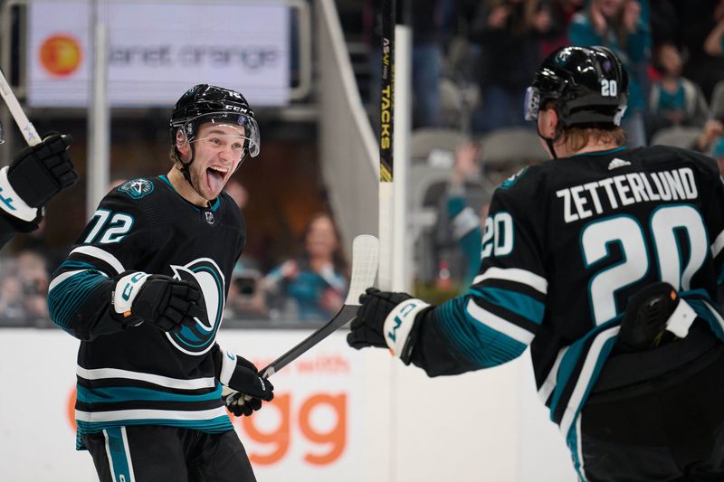 Mar 23, 2024; San Jose, California, USA; San Jose Sharks left wing William Eklund (72) reacts after left wing Fabian Zetterlund (20) scored his second goal of the game against the Chicago Blackhawks during the second period at SAP Center at San Jose. Mandatory Credit: Robert Edwards-USA TODAY Sports