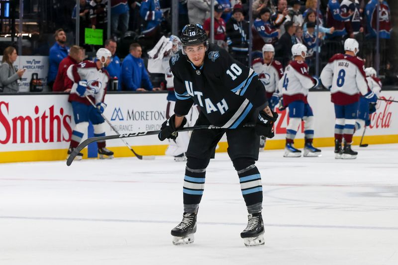 Oct 24, 2024; Salt Lake City, Utah, USA; Utah Hockey Club defenseman Maveric Lamoureux (10) warms up before a game against the before the game against the Colorado Avalanche at Delta Center. Mandatory Credit: Rob Gray-Imagn Images