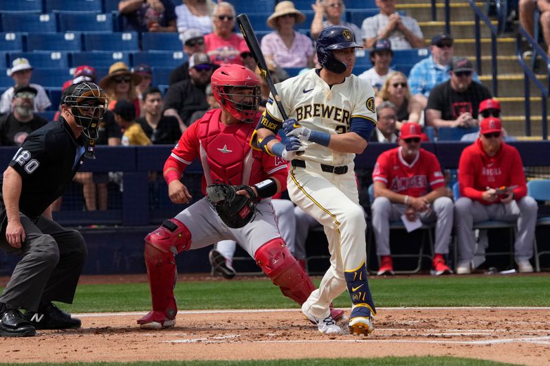 Mar 18, 2024; Phoenix, Arizona, USA; Milwaukee Brewers second baseman Brice Turang (2) hits an RBI double against the Los Angeles Angels in the first inning at American Family Fields of Phoenix. Mandatory Credit: Rick Scuteri-USA TODAY Sports