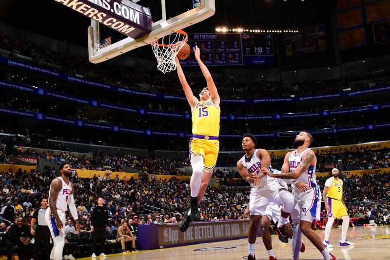 LOS ANGELES, CA - NOVEMBER 8: Austin Reaves #15 of the Los Angeles Lakers shoots the ball during the game against the Philadelphia 76ers on Novemberr 8, 2024 at Crypto.Com Arena in Los Angeles, California. NOTE TO USER: User expressly acknowledges and agrees that, by downloading and/or using this Photograph, user is consenting to the terms and conditions of the Getty Images License Agreement. Mandatory Copyright Notice: Copyright 2024 NBAE (Photo by Adam Pantozzi/NBAE via Getty Images)