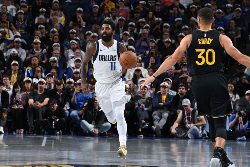 SAN FRANCISCO, CA - NOVEMBER 12: Kyrie Irving #11 of the Dallas Mavericks dribbles the ball during the game against the Golden State Warriors during the Emirates NBA Cup game on November 12, 2024 at Chase Center in San Francisco, California. NOTE TO USER: User expressly acknowledges and agrees that, by downloading and or using this photograph, user is consenting to the terms and conditions of Getty Images License Agreement. Mandatory Copyright Notice: Copyright 2024 NBAE (Photo by Noah Graham/NBAE via Getty Images)