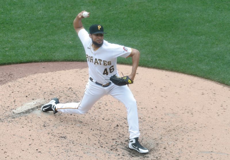 Aug 23, 2023; Pittsburgh, Pennsylvania, USA;  Pittsburgh Pirates relief pitcher Yohan Ramirez (46) pitches against the St. Louis Cardinals during the fourth inning at PNC Park. Mandatory Credit: Charles LeClaire-USA TODAY Sports