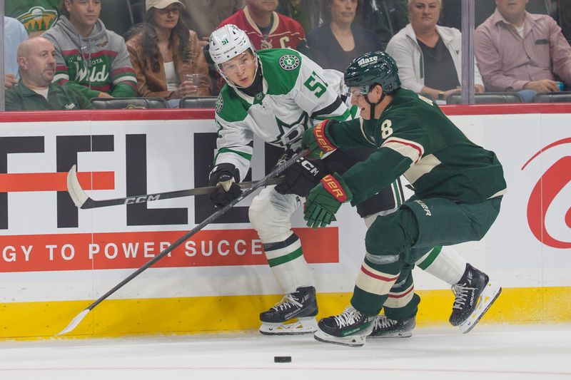 Sep 25, 2025; Saint Paul, Minnesota, USA; Minnesota Wild defenseman Zeev Buium (8) breaks up a pass from Dallas Stars forward Jack Becker (51) in the first period at Grand Casino Arena. Mandatory Credit: Matt Blewett-Imagn Images
