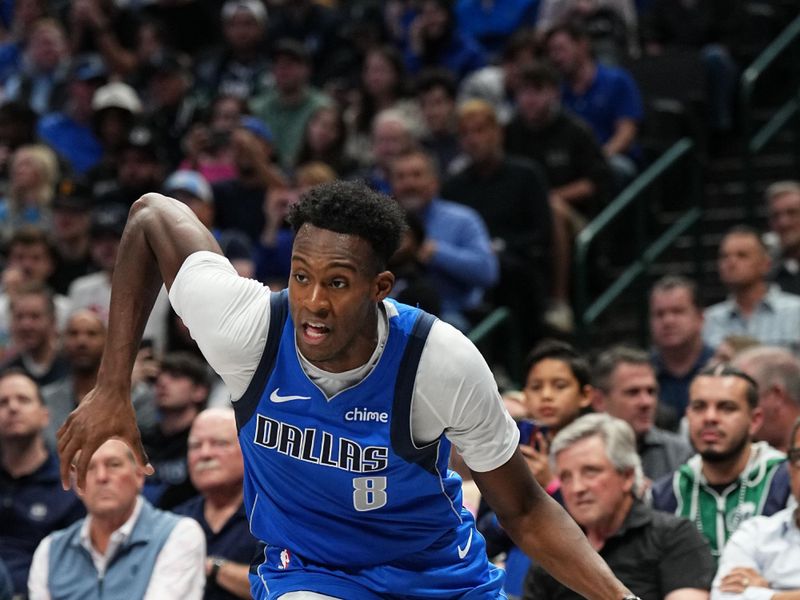 DALLAS, TX - NOVEMBER 6: Olivier Maxence-Prosper #8 of the Dallas Mavericks drives to the basket during the game against the Chicago Bulls on November 6, 2024 at American Airlines Center in Dallas, Texas. NOTE TO USER: User expressly acknowledges and agrees that, by downloading and or using this photograph, User is consenting to the terms and conditions of the Getty Images License Agreement. Mandatory Copyright Notice: Copyright 2024 NBAE (Photo by Glenn James/NBAE via Getty Images)