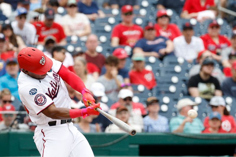 Apr 16, 2023; Washington, District of Columbia, USA; Washington Nationals left fielder Stone Garrett (36) hits a double against the Cleveland Guardians during the second inning at Nationals Park. Mandatory Credit: Geoff Burke-USA TODAY Sports