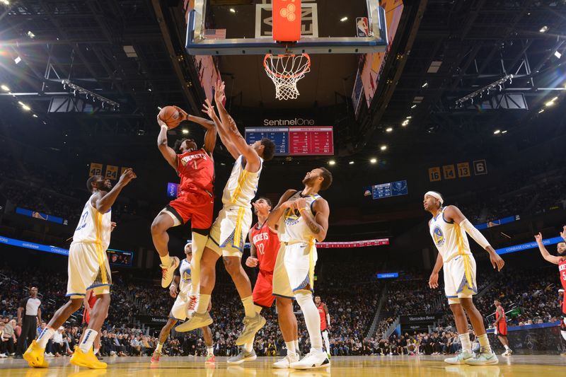 SAN FRANCISCO, CA - DECEMBER 5: Amen Thompson #1 of the Houston Rockets drives to the basket during the game against the Golden State Warriors on December 5, 2024 at Chase Center in San Francisco, California. NOTE TO USER: User expressly acknowledges and agrees that, by downloading and or using this photograph, user is consenting to the terms and conditions of Getty Images License Agreement. Mandatory Copyright Notice: Copyright 2024 NBAE (Photo by Noah Graham/NBAE via Getty Images)