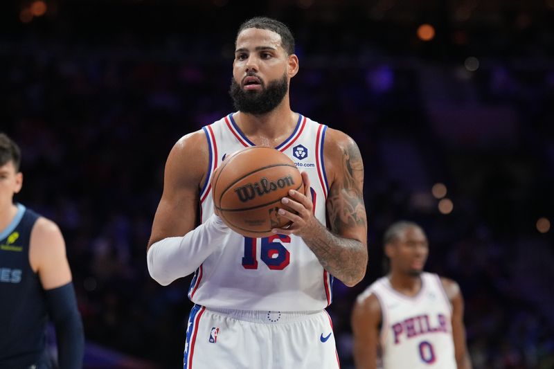 PHILADELPHIA, PA - NOVEMBER 2: Caleb Martin #16 of the Philadelphia 76ers shoots a free throw during the game against the Memphis Grizzlies on November 2, 2024 at the Wells Fargo Center in Philadelphia, Pennsylvania NOTE TO USER: User expressly acknowledges and agrees that, by downloading and/or using this Photograph, user is consenting to the terms and conditions of the Getty Images License Agreement. Mandatory Copyright Notice: Copyright 2024 NBAE (Photo by Jesse D. Garrabrant/NBAE via Getty Images)