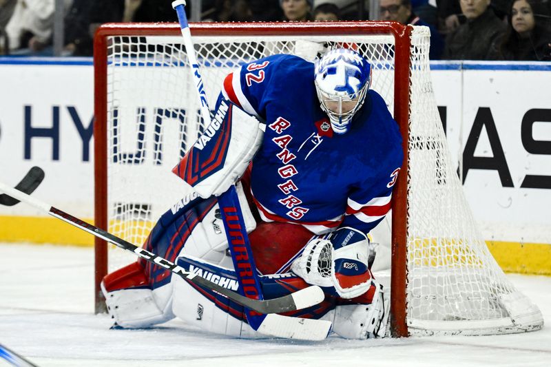 Nov 30, 2024; New York, New York, USA; New York Rangers goaltender Jonathan Quick (32) makes a save against the Montreal Canadiens during the second period at Madison Square Garden. Mandatory Credit: John Jones-Imagn Images