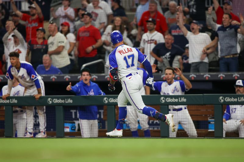 May 6, 2023; Atlanta, Georgia, USA; Atlanta Braves left fielder Kevin Pillar (17) hits a two run home run against the Baltimore Orioles in the eighth inning at Truist Park. Mandatory Credit: Brett Davis-USA TODAY Sports