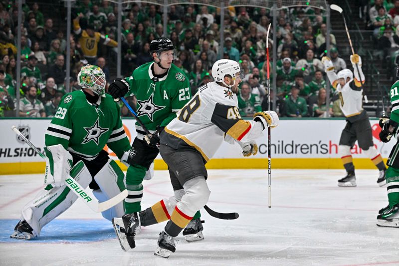 Apr 22, 2024; Dallas, Texas, USA; Vegas Golden Knights center Tomas Hertl (48) celebrates a goal scored by right wing Mark Stone (not pictured) against Dallas Stars goaltender Jake Oettinger (29) as defenseman Esa Lindell (23) looks on during the first period in game one of the first round of the 2024 Stanley Cup Playoffs at the American Airlines Center. Mandatory Credit: Jerome Miron-USA TODAY Sports