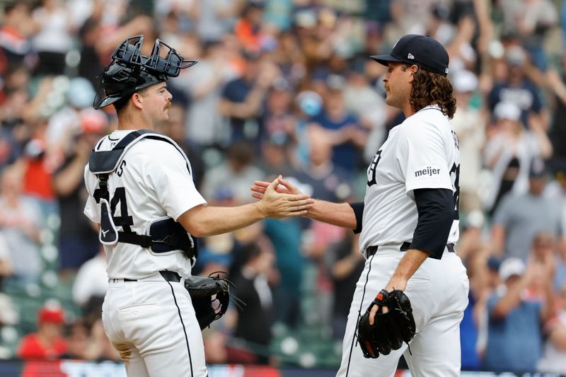 Apr 28, 2024; Detroit, Michigan, USA;  Detroit Tigers catcher Jake Rogers (34) and relief pitcher Jason Foley (68) celebrate after defeating the Kansas City Royals at Comerica Park. Mandatory Credit: Rick Osentoski-USA TODAY Sports