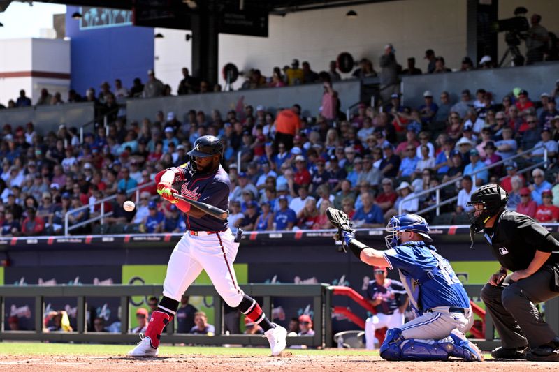 Mar 20, 2024; North Port, Florida, USA; Atlanta Braves center fielder Michael Harris III (23) gets on base with a fielders choice in the second inning of a spring training game against the Toronto Blue Jays  at CoolToday Park. Mandatory Credit: Jonathan Dyer-USA TODAY Sports