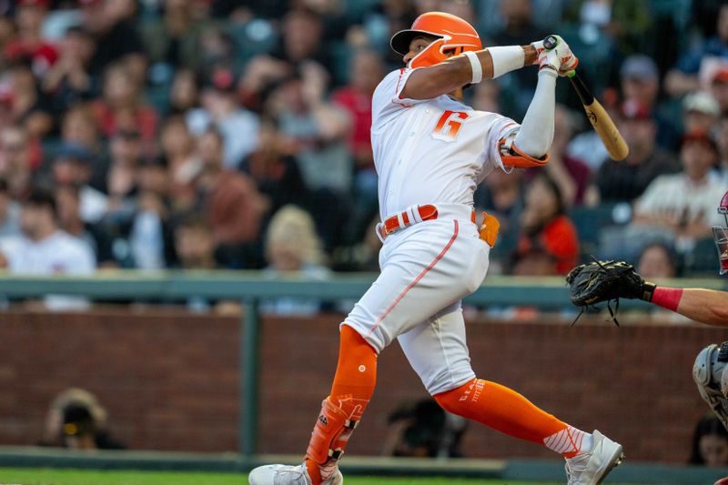 Aug 29, 2023; San Francisco, California, USA;  San Francisco Giants right fielder Luis Matos (29) hits an RBI double against the Cincinnati Reds during the second inning at Oracle Park. Mandatory Credit: Neville E. Guard-USA TODAY Sports