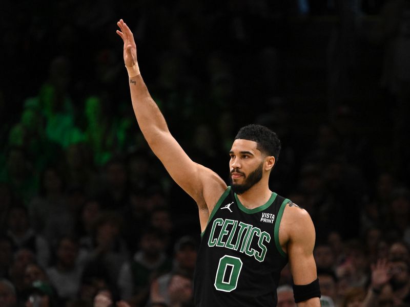 BOSTON, MASSACHUSETTS - JANUARY 27: Jayson Tatum #0 of the Boston Celtics waves to the crowd during the first quarter of a game against the LA Clippers at the TD Garden on January 27, 2024 in Boston, Massachusetts. NOTE TO USER: User expressly acknowledges and agrees that, by downloading and or using this photograph, User is consenting to the terms and conditions of the Getty Images License Agreement. (Photo by Brian Fluharty/Getty Images)