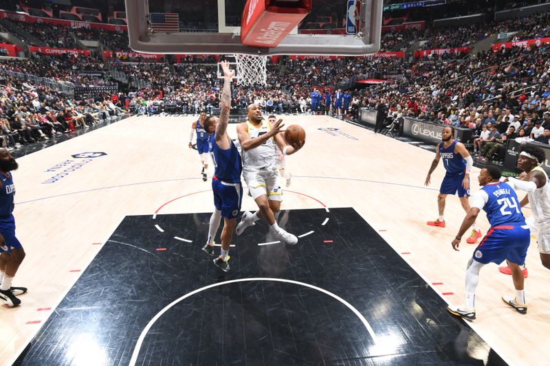 LOS ANGELES, CA - APRIL 5:  Talen Horton-Tucker #5 of the Utah Jazz goes to the basket during the game on April 5, 2024 at Crypto.Com Arena in Los Angeles, California. NOTE TO USER: User expressly acknowledges and agrees that, by downloading and/or using this Photograph, user is consenting to the terms and conditions of the Getty Images License Agreement. Mandatory Copyright Notice: Copyright 2024 NBAE (Photo by Adam Pantozzi/NBAE via Getty Images)