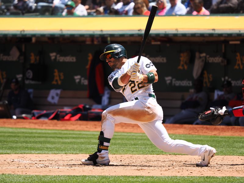 May 31, 2023; Oakland, California, USA; Oakland Athletics right fielder Ramon Laureano (22) hits an RBI single against the Atlanta Braves during the sixth inning at Oakland-Alameda County Coliseum. Mandatory Credit: Kelley L Cox-USA TODAY Sports