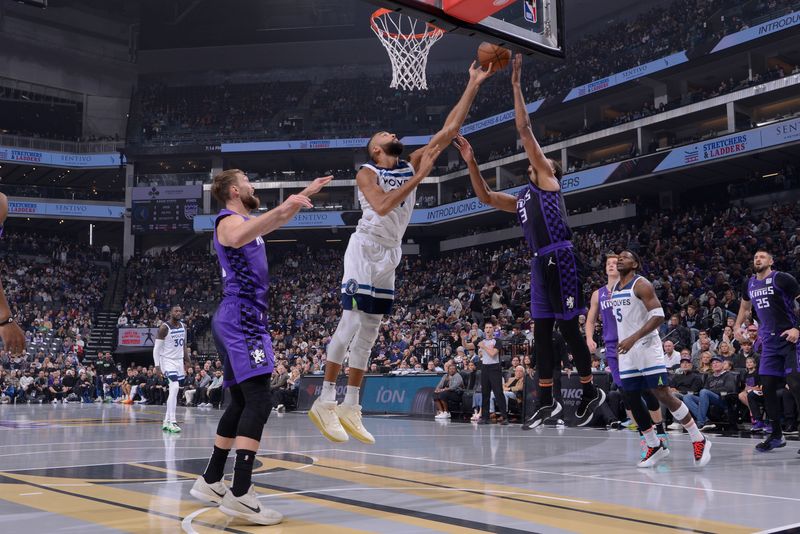 SACRAMENTO, CA - NOVEMBER 15: Rudy Gobert #27 of the Minnesota Timberwolves drives to the basket during the game against the Sacramento Kings during the Emirates NBA Cup game on November 15, 2024 at Golden 1 Center in Sacramento, California. NOTE TO USER: User expressly acknowledges and agrees that, by downloading and or using this Photograph, user is consenting to the terms and conditions of the Getty Images License Agreement. Mandatory Copyright Notice: Copyright 2024 NBAE (Photo by Rocky Widner/NBAE via Getty Images)