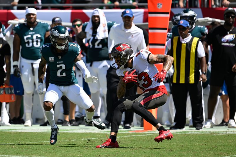 Tampa Bay Buccaneers' Mike Evans tries to get past Philadelphia Eagles' Darius Slay Jr. during the first half of an NFL football game, Sunday, Sept. 29, 2024, in Tampa, Fla. (AP Photo/Jason Behnken)