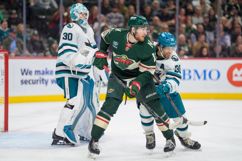 Nov 11, 2025; Saint Paul, Minnesota, USA; Minnesota Wild center Yakov Trenin (13) is checked in front of the net by San Jose Sharks defenseman Mario Ferraro (38) in the second period at Grand Casino Arena. Mandatory Credit: Matt Blewett-Imagn Images
