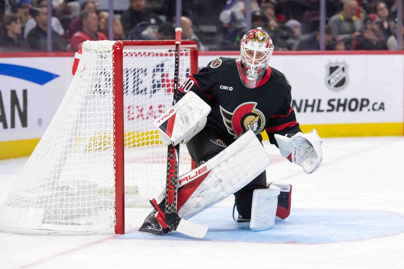 Oct 14, 2024; Ottawa, Ontario, CAN; Ottawa Senators goalie Mads Sogaard (40) warms up as he is called in to replace Anton Forsberg (35-not pictured) in the second period against the  Los Angeles Kings  at the Canadian Tire Centre. Mandatory Credit: Marc DesRosiers-Imagn Images