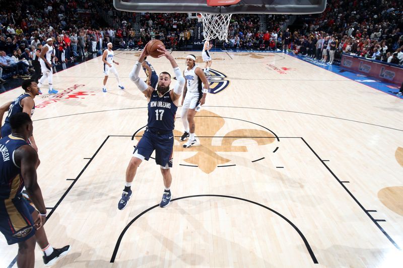 NEW ORLEANS, LA - APRIL 3:  Jonas Valanciunas #17 of the New Orleans Pelicans grabs a rebound during the game against the Orlando Magic on April 3, 2024 at the Smoothie King Center in New Orleans, Louisiana. NOTE TO USER: User expressly acknowledges and agrees that, by downloading and or using this Photograph, user is consenting to the terms and conditions of the Getty Images License Agreement. Mandatory Copyright Notice: Copyright 2024 NBAE (Photo by Layne Murdoch Jr./NBAE via Getty Images)