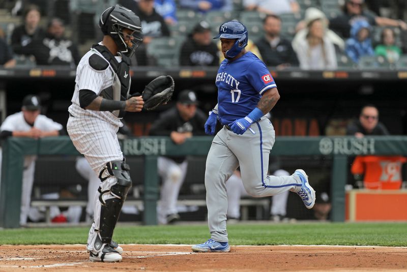 Apr 17, 2024; Chicago, Illinois, USA; Kansas City Royals outfielder Nelson Velázquez (17) scores after a RBI single by second baseman Adam Frazier (26) during game one of a double header against the Chicago White Sox at Guaranteed Rate Field. Mandatory Credit: Melissa Tamez-USA TODAY Sports