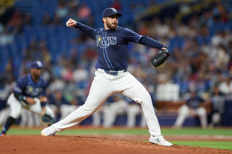 Apr 3, 2024; St. Petersburg, Florida, USA;  Tampa Bay Rays designated hitter Harold Ramirez (43) throws a pitch against the Texas Rangers in the fourth inning at Tropicana Field. Mandatory Credit: Nathan Ray Seebeck-USA TODAY Sports