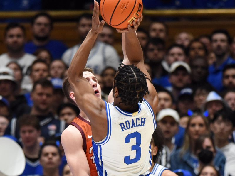 Feb 25, 2023; Durham, North Carolina, USA; Duke Blue Devils guard Jeremy Roach (3) shoots over Virginia Tech Hokies guard Sean Pedulla (3) during the first half at Cameron Indoor Stadium. Mandatory Credit: Rob Kinnan-USA TODAY Sports