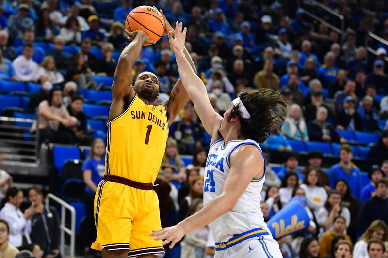 Mar 2, 2023; Los Angeles, California, USA; Arizona State Sun Devils guard Luther Muhammad (1) shoots against UCLA Bruins guard Jaime Jaquez Jr. (24) during the first half at Pauley Pavilion. Mandatory Credit: Gary A. Vasquez-USA TODAY Sports