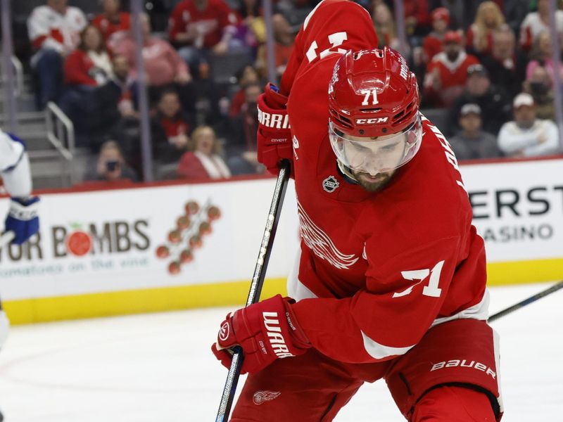 Jan 25, 2025; Detroit, Michigan, USA;  Detroit Red Wings center Dylan Larkin (71) skates with the puck in the second period against the Tampa Bay Lightning at Little Caesars Arena. Mandatory Credit: Rick Osentoski-Imagn Images