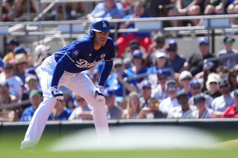 Mar 9, 2024; Phoenix, Arizona, USA; Los Angeles Dodgers first baseman Freddie Freeman (5) leads off first base against the Texas Rangers during the first inning at Camelback Ranch-Glendale. Mandatory Credit: Joe Camporeale-USA TODAY Sports