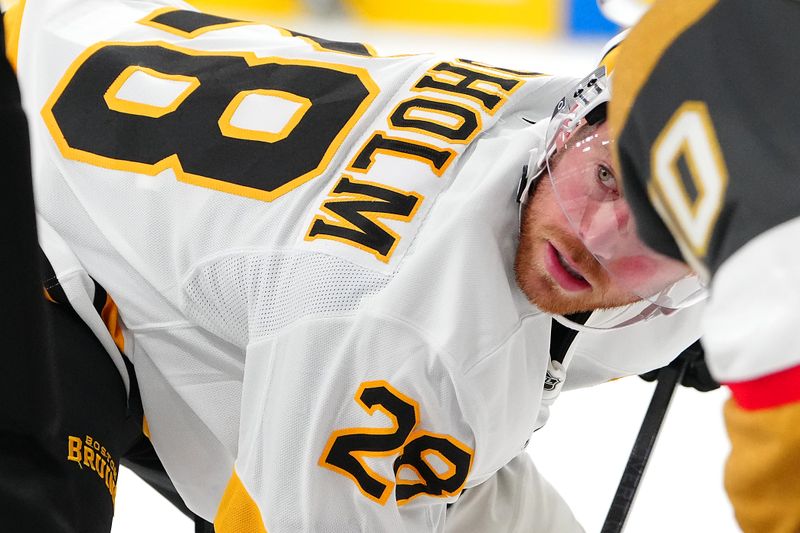Oct 16, 2025; Las Vegas, Nevada, USA; Boston Bruins center Elias Lindholm (28) prepares for a face off against the Vegas Golden Knights during the first period at T-Mobile Arena. Mandatory Credit: Stephen R. Sylvanie-Imagn Images