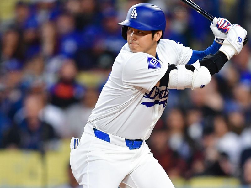 Apr 3, 2024; Los Angeles, California, USA; Los Angeles Dodgers designated hitter Shohei Ohtani (17) hits against the San Francisco Giants during the first inning at Dodger Stadium. Mandatory Credit: Gary A. Vasquez-USA TODAY Sports