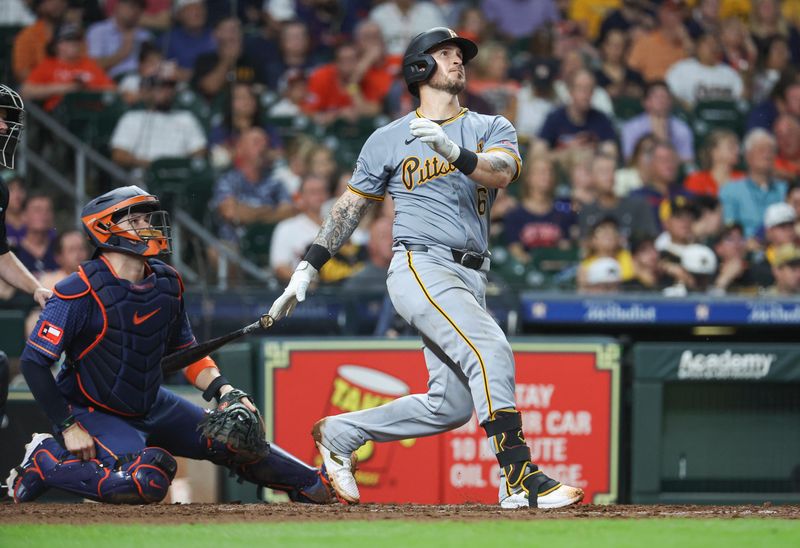 Jul 29, 2024; Houston, Texas, USA; Pittsburgh Pirates catcher Yasmani Grandal (6) hits a home run during the sixth inning against the Houston Astros at Minute Maid Park. Mandatory Credit: Troy Taormina-USA TODAY Sports