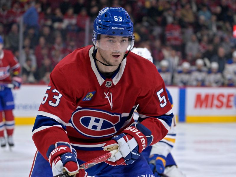 Oct 20, 2025; Montreal, Quebec, CAN; Montreal Canadiens defenseman Noah Dobson (53) tracks the puck during the second period of the game against the Buffalo Sabres at the Bell Centre. Mandatory Credit: Eric Bolte-Imagn Images