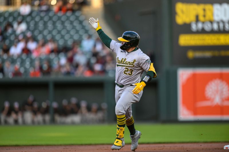 Apr 26, 2024; Baltimore, Maryland, USA; Oakland Athletics catcher Shea Langeliers (23) reacts after hitting a home run during the first inning against the Baltimore Orioles at Oriole Park at Camden Yards. Mandatory Credit: Reggie Hildred-USA TODAY Sports