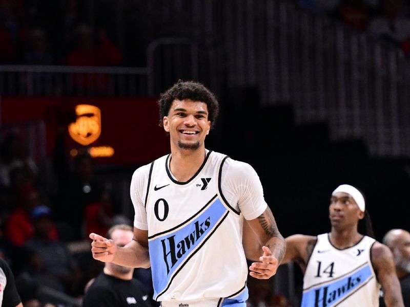 ATLANTA, GA - MARCH 23: Dominick Barlow #0 of the Atlanta Hawks celebrates during the game against the Philadelphia 76ers on March 23, 2025 at State Farm Arena in Atlanta, Georgia.  NOTE TO USER: User expressly acknowledges and agrees that, by downloading and/or using this Photograph, user is consenting to the terms and conditions of the Getty Images License Agreement. Mandatory Copyright Notice: Copyright 2025 NBAE (Photo by Adam Hagy/NBAE via Getty Images)