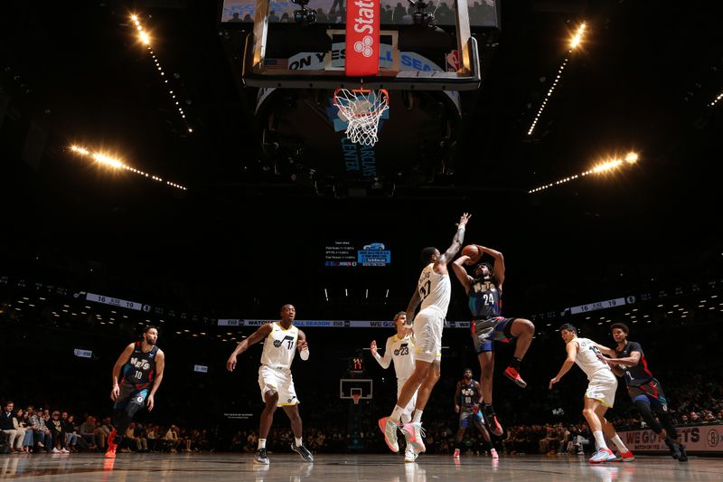 BROOKLYN, NY - JANUARY 29: Cam Thomas #24 of the Brooklyn Nets drives to the basket during the game against the Utah Jazz on January 29, 2024 at Barclays Center in Brooklyn, New York. NOTE TO USER: User expressly acknowledges and agrees that, by downloading and or using this Photograph, user is consenting to the terms and conditions of the Getty Images License Agreement. Mandatory Copyright Notice: Copyright 2024 NBAE (Photo by Nathaniel S. Butler/NBAE via Getty Images)