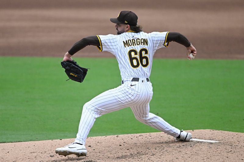 May 28, 2025; San Diego, California, USA; San Diego Padres relief pitcher David Morgan (66) delivers during the sixth inning against the Miami Marlins at Petco Park. Mandatory Credit: Denis Poroy-Imagn Images
