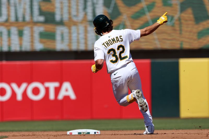 Sep 14, 2025; West Sacramento, California, USA; Athletics center fielder Colby Thomas (32) reacts after hitting a solo home run against the Cincinnati Reds during the fourth inning at Sutter Health Park. Mandatory Credit: Dennis Lee-Imagn Images