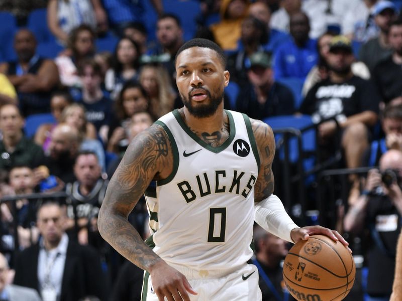 ORLANDO, FL - APRIL 14: Damian Lillard #0 of the Milwaukee Bucks handles the ball during the game against the Orlando Magic on April 14, 2024 at Kia Center in Orlando, Florida. NOTE TO USER: User expressly acknowledges and agrees that, by downloading and or using this photograph, User is consenting to the terms and conditions of the Getty Images License Agreement. Mandatory Copyright Notice: Copyright 2024 NBAE (Photo by Fernando Medina/NBAE via Getty Images)