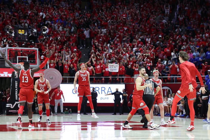 Dec 9, 2023; Salt Lake City, Utah, USA; The Utah Utes celebrate their win over the Brigham Young Cougars at Jon M. Huntsman Center. Mandatory Credit: Rob Gray-USA TODAY Sports