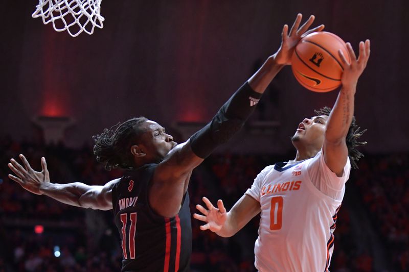 Jan 21, 2024; Champaign, Illinois, USA; Rutgers Scarlet Knights center Clifford Omoruyi (11) blocks the shot of Illinois Fighting Illini guard Terrence Shannon Jr. (0) during the first half at State Farm Center. Mandatory Credit: Ron Johnson-USA TODAY Sports