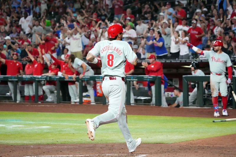 Aug 8, 2024; Phoenix, Arizona, USA; Philadelphia Phillies outfielder Nick Castellanos (8) scores a run against the Arizona Diamondbacks during the sixth inning at Chase Field. Mandatory Credit: Joe Camporeale-USA TODAY Sports