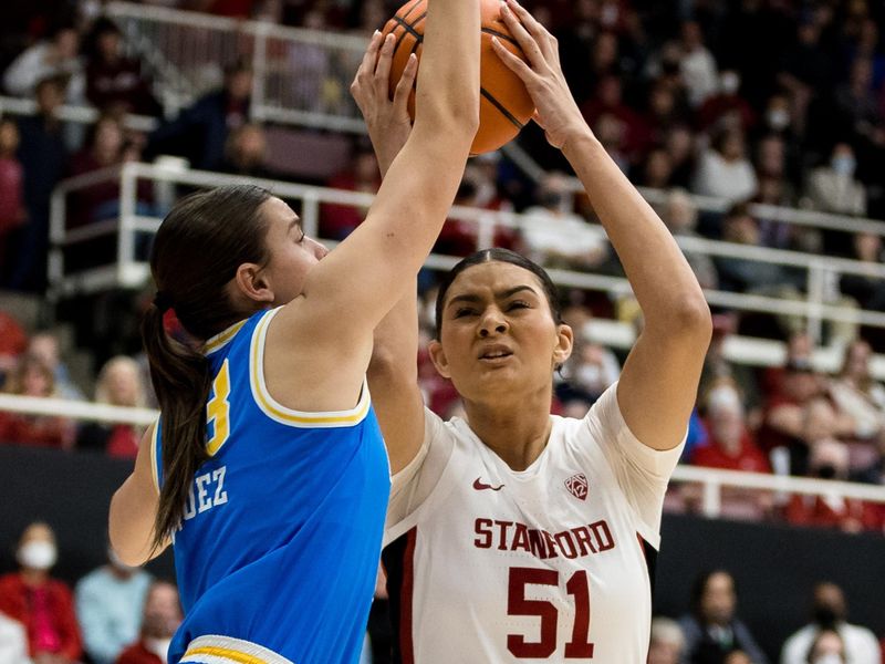 Feb 20, 2023; Stanford, California, USA;  UCLA Bruins forward Gabriela Jaquez (23) defends Stanford Cardinal center Lauren Betts (51) during the first half at Maples Pavilion. Mandatory Credit: John Hefti-USA TODAY Sports